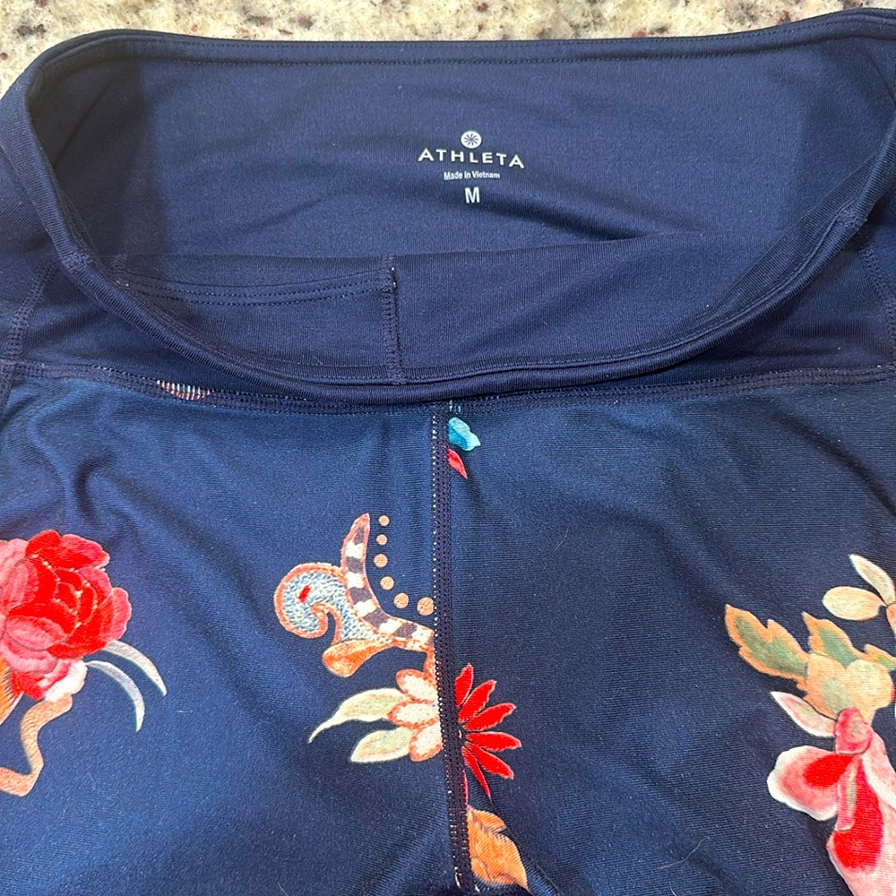 Athleta Navy blue with floral detail legging